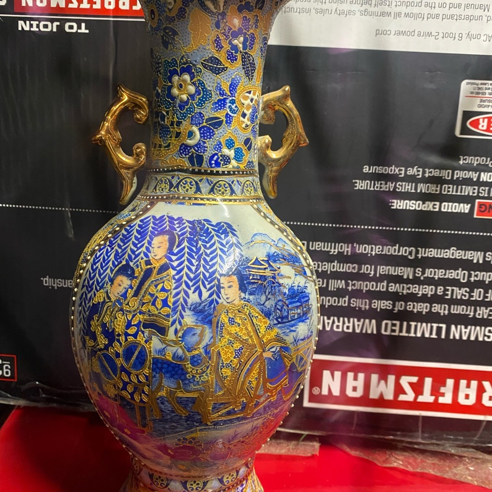 Elegant Blue and Gold Porcelain Vase